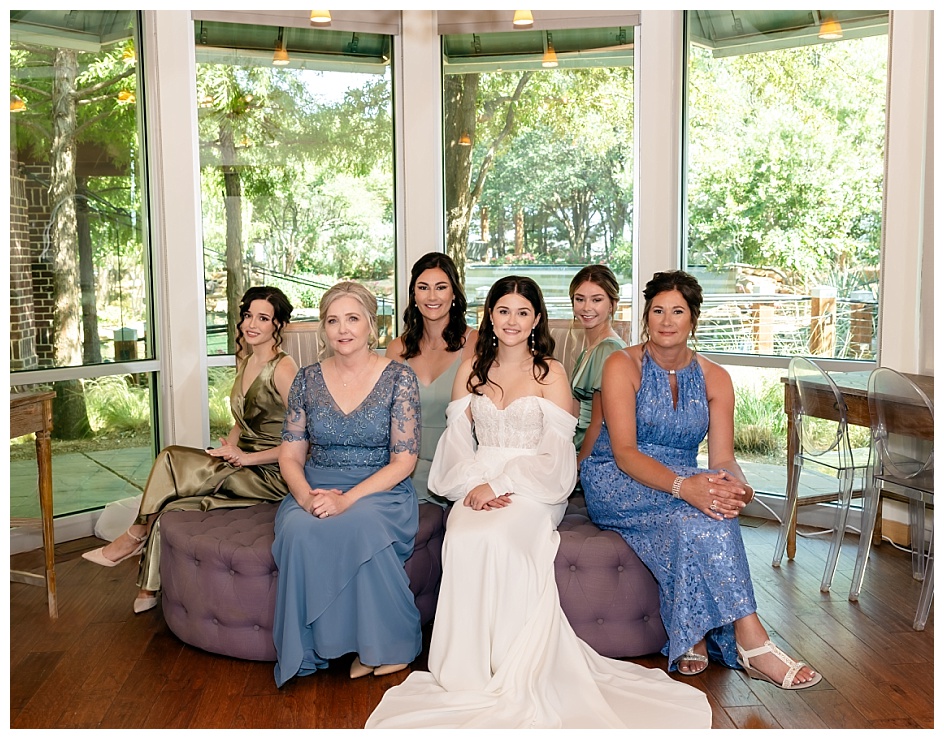 Bride with bridal party in the bridal suite at the Willows
