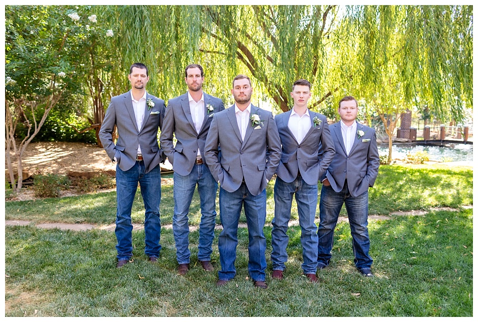 Groom with Groomsmen in the V formation at the Willows Event Center Garden