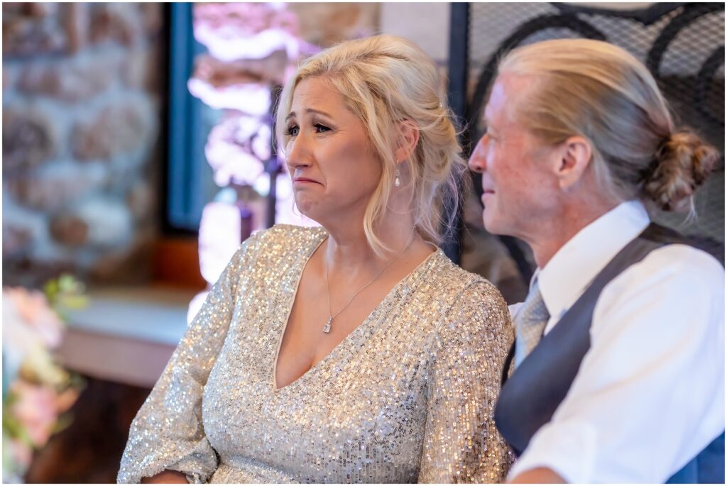 Woman getting emotional at a wedding reception